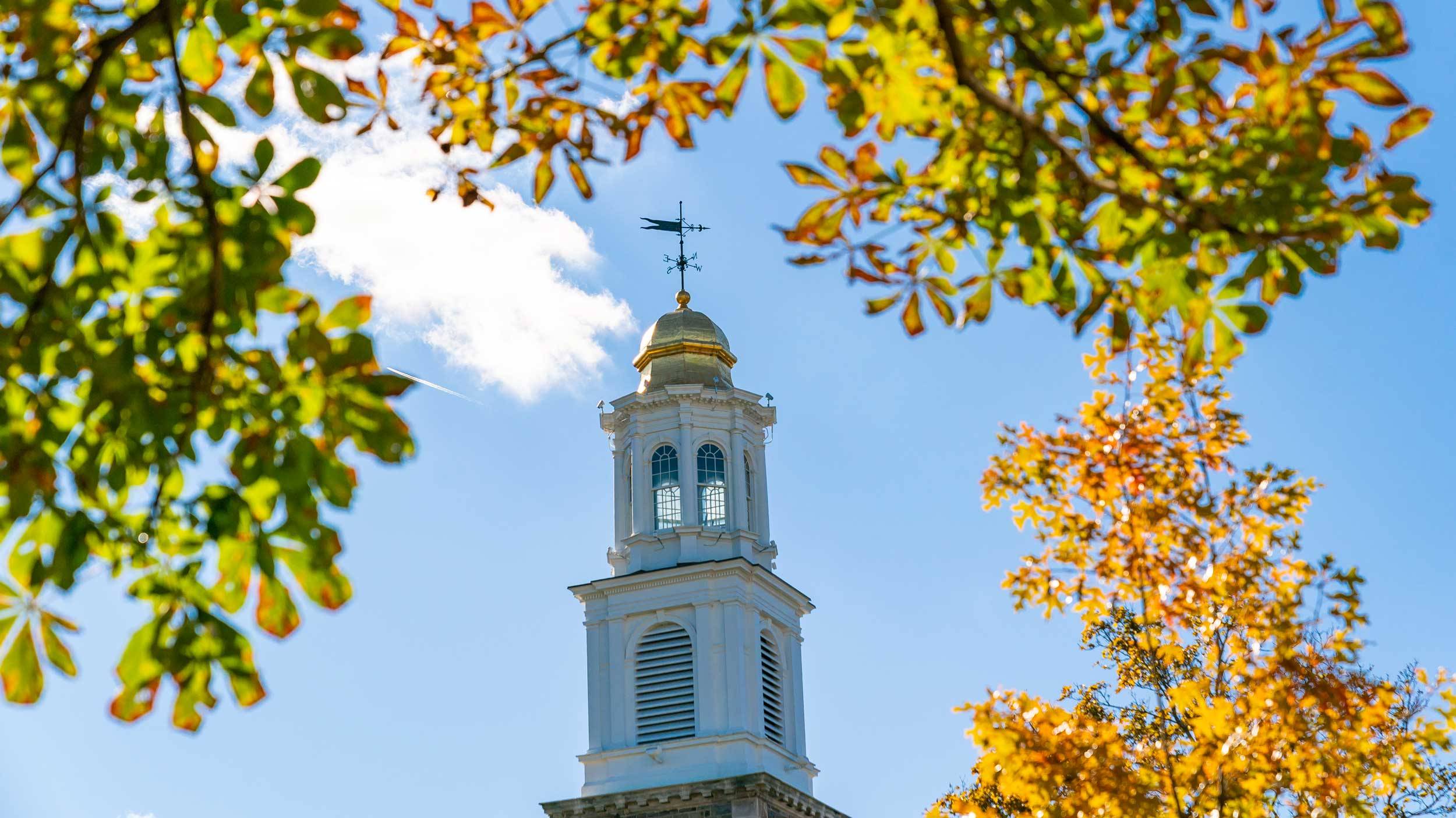 Alumni Memorial Chapel against a blue sky in autumn