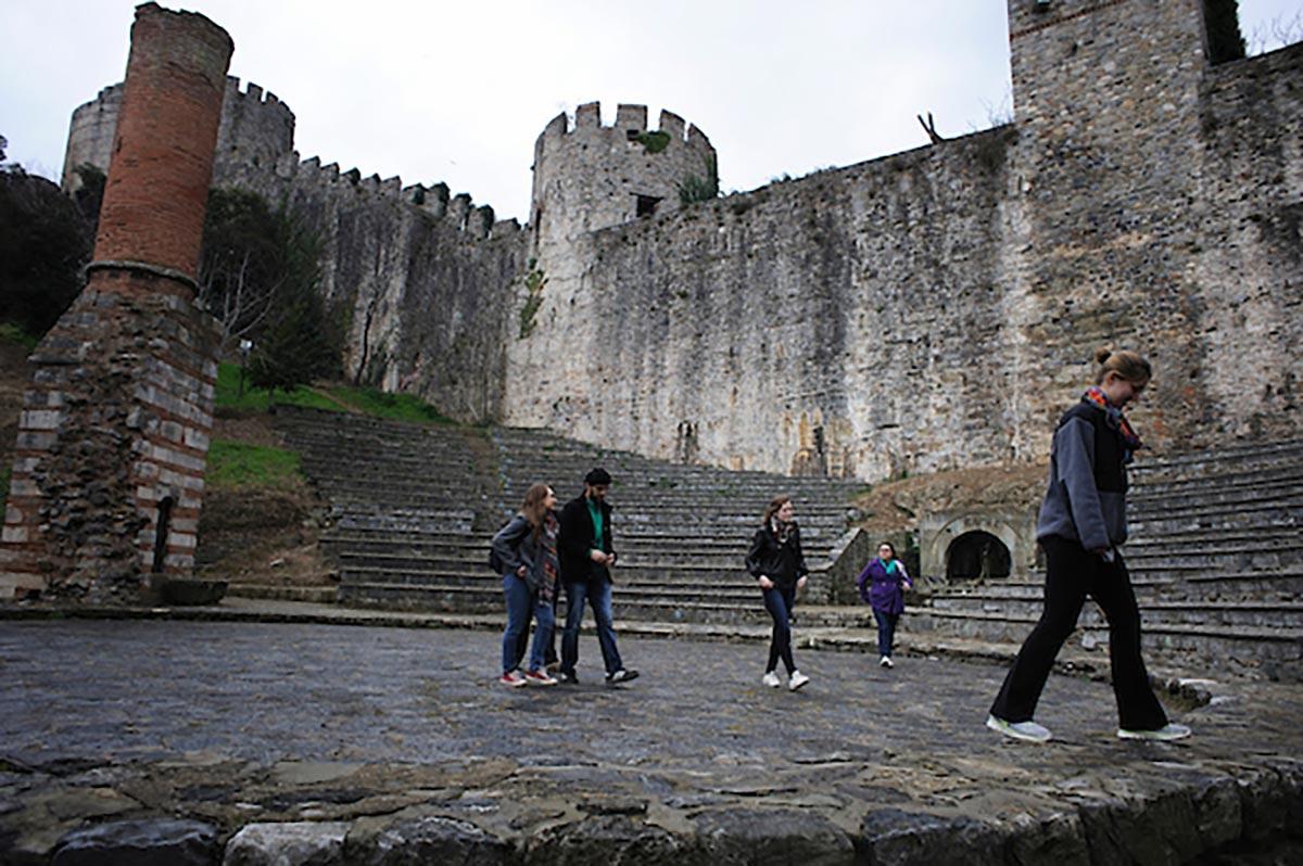 Students traveling in Istanbul tour Rumelian Castle, sometimes referred to as Rumeli Fortress.