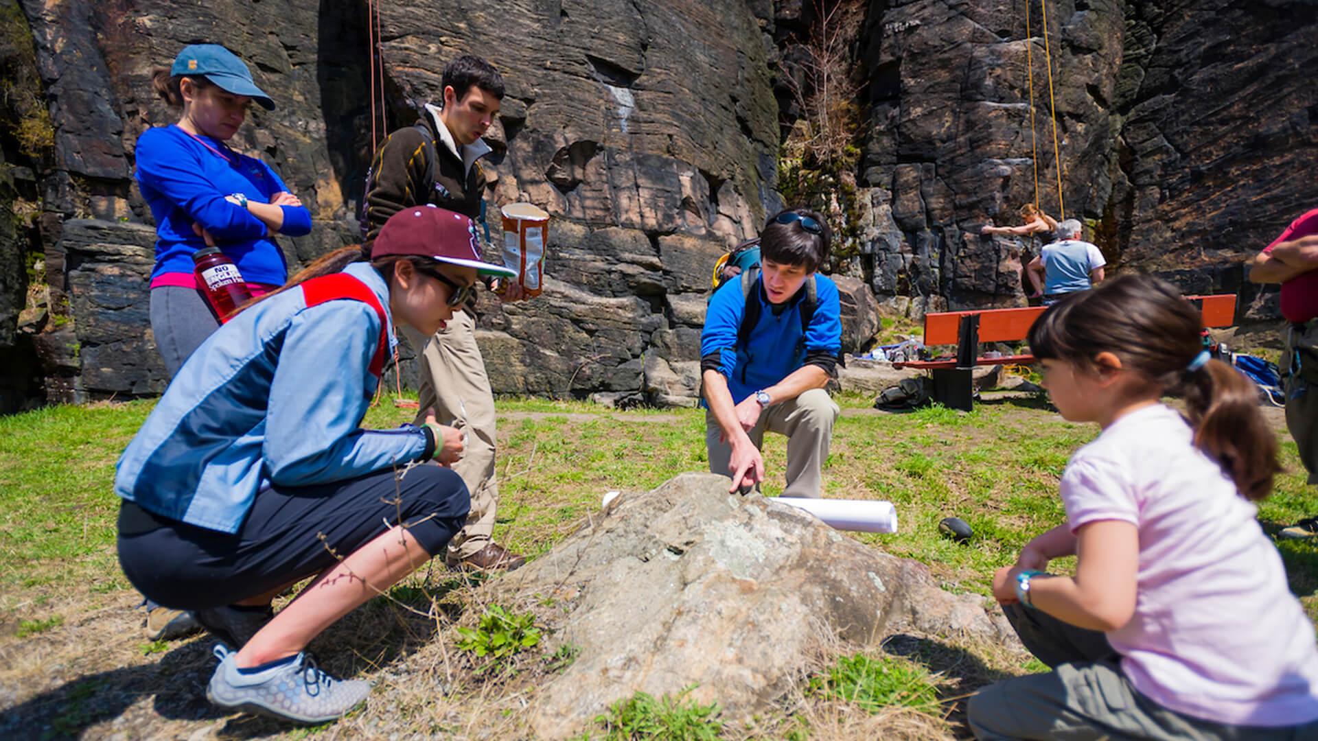 Students and faculty members spend an afternoon lab exploring the geology of Moss Island in Little Falls, N.Y., with geology professor Martin Wong.