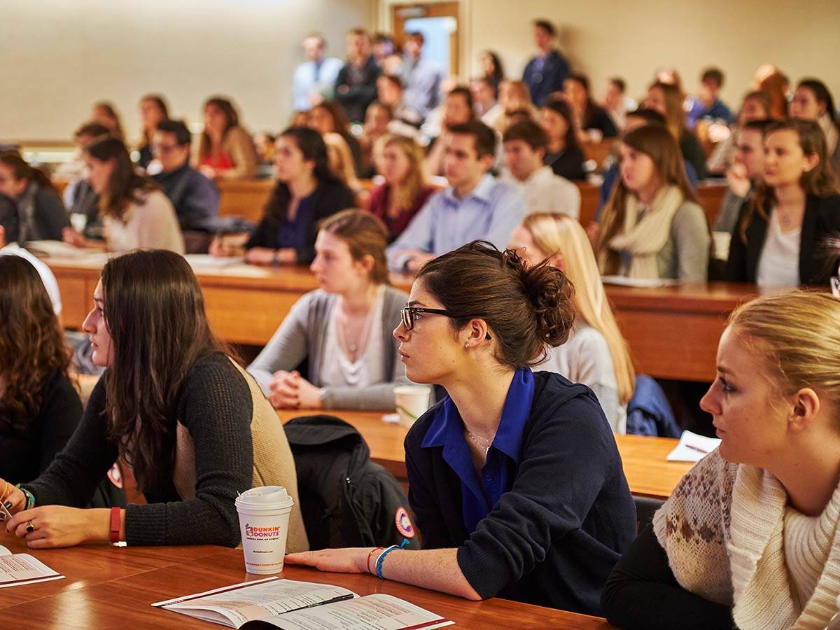 Students fill the Ho 101 lecture hall for a Career Services presentation on networking