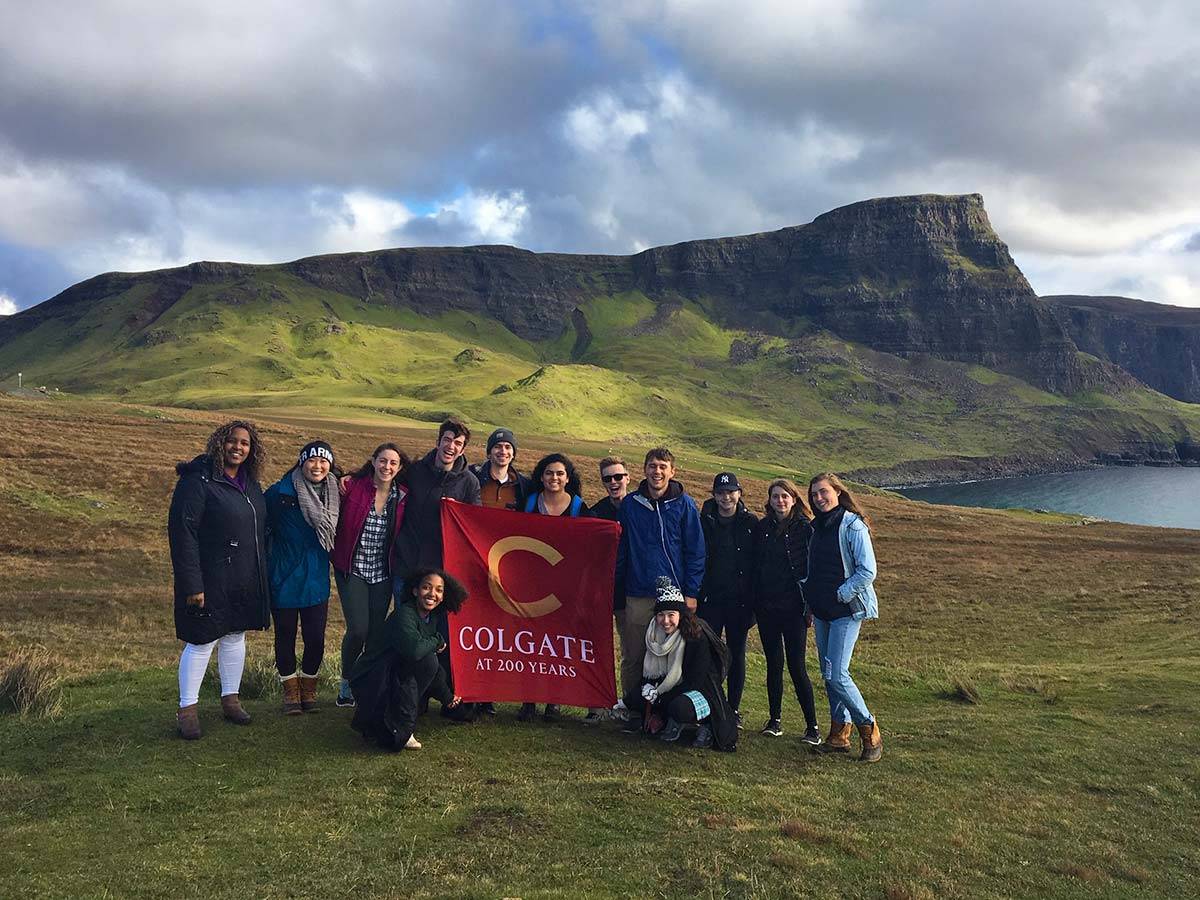Students in the Scottish Highlands hold up a Colgate at 200 Years banner