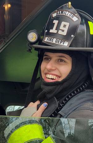 Charlotte in a fire truck.