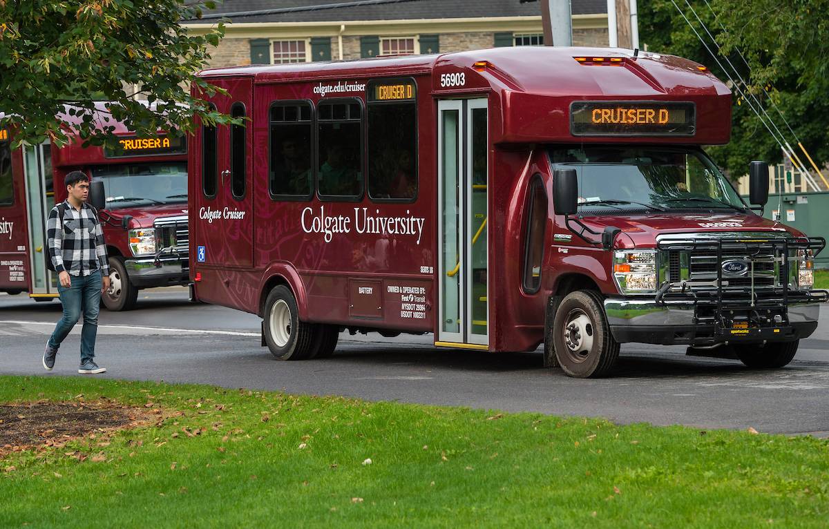 Student walking on to Cruiser shuttle