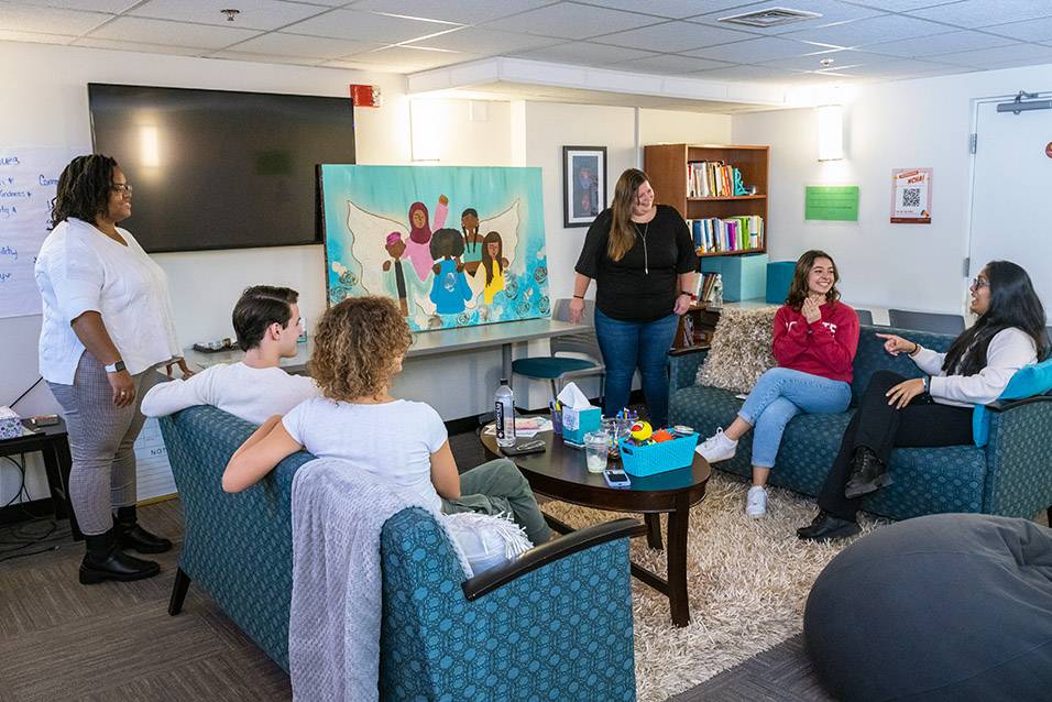 Students and staff gather for a session at Haven