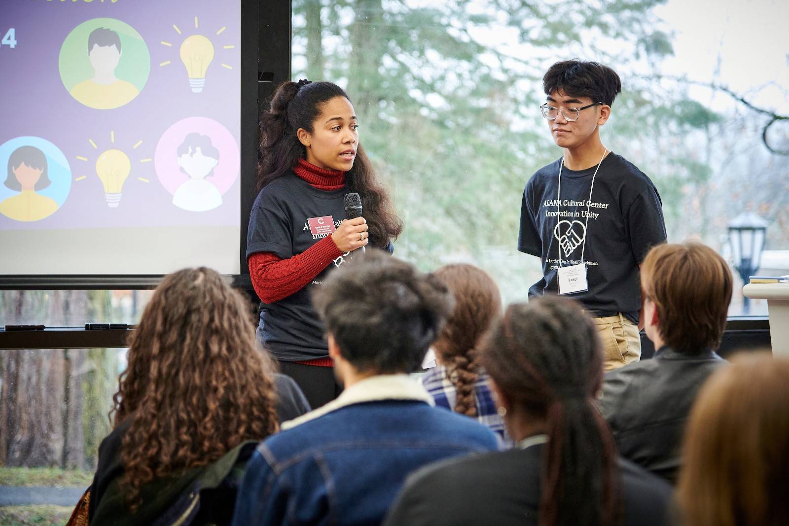 An employee and student present at the Social Justice Summit