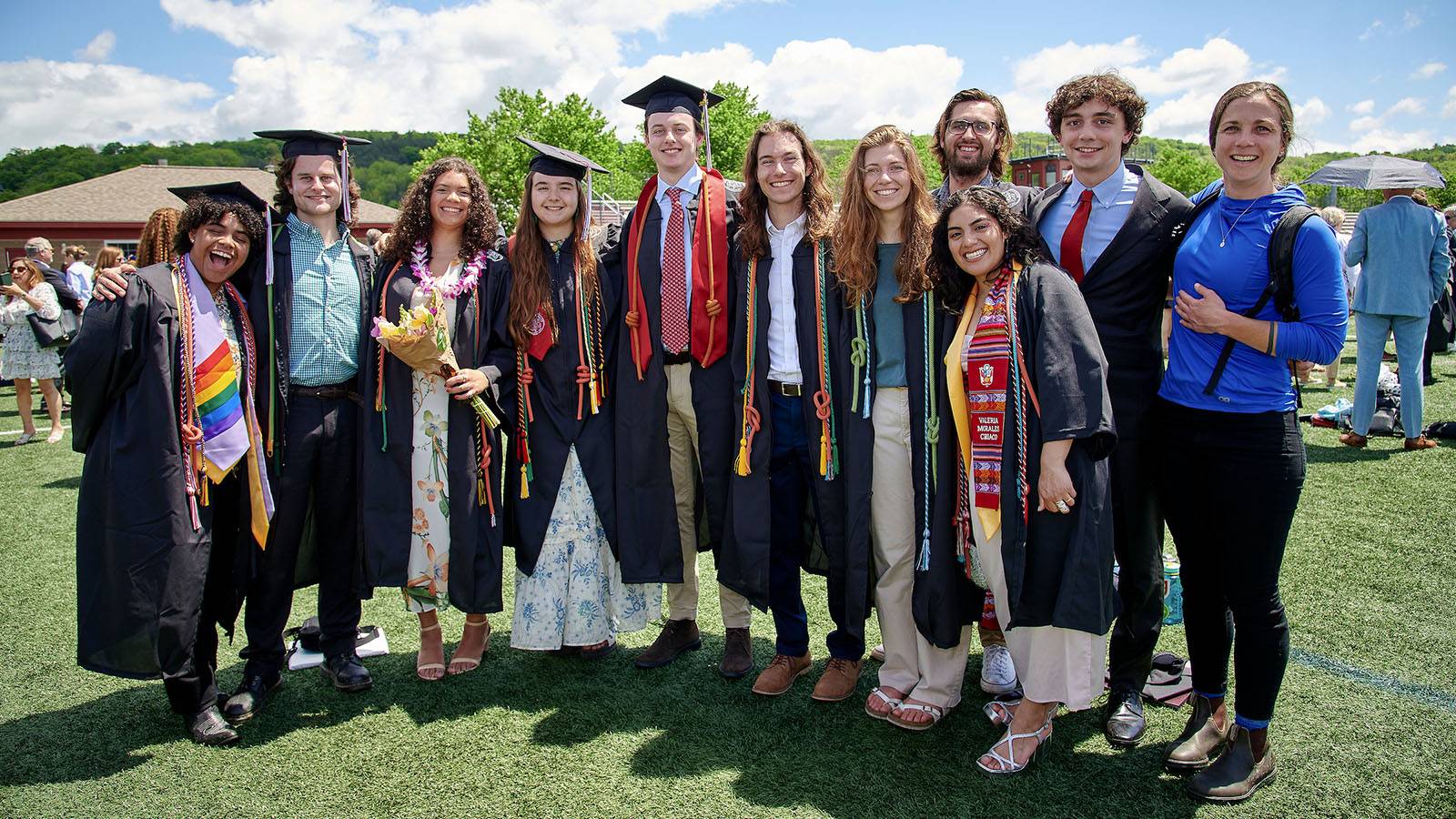 Students pose for photos at Commencement