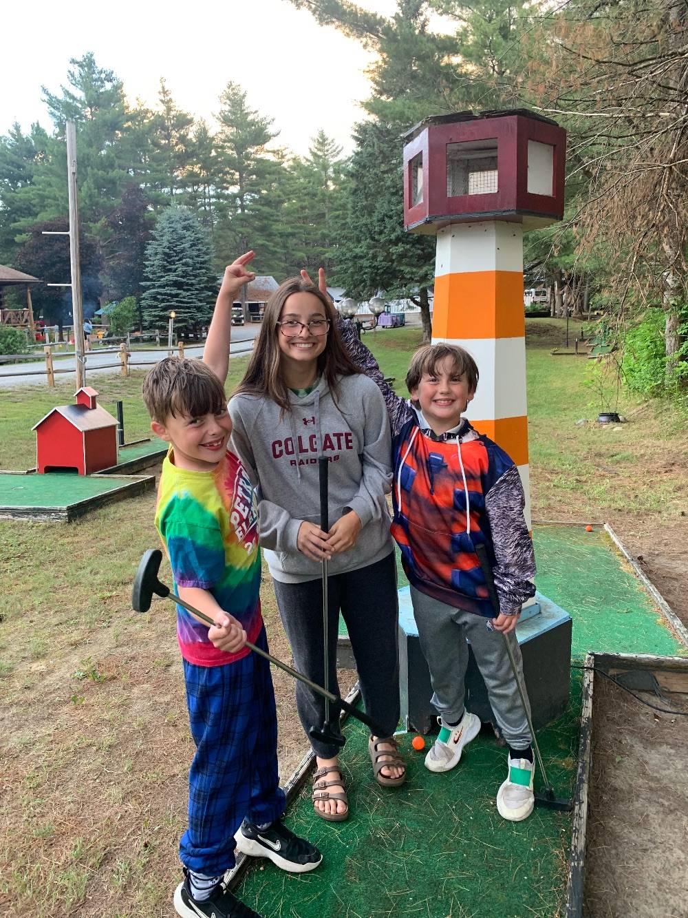 Biddie Clive ’27 with students in Saranac Lake