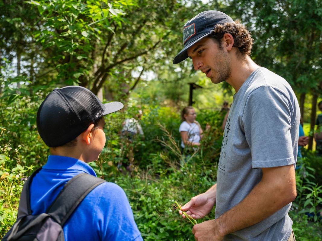 Local elementary school students volunteer at Rogers Environmental Education Center, to create an area where native plants will be planted to create a native bee environment and also to remove invasive species plants, July 22, 2024. The students worked with Charlie Tourbaf ’25, as part of a research project with the Upstate Institute's Summer Field School.