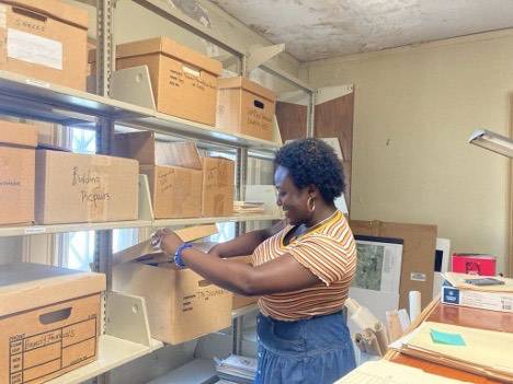 Salem Sokpoli ’26 organizes historical documents at the Oneida County History Center