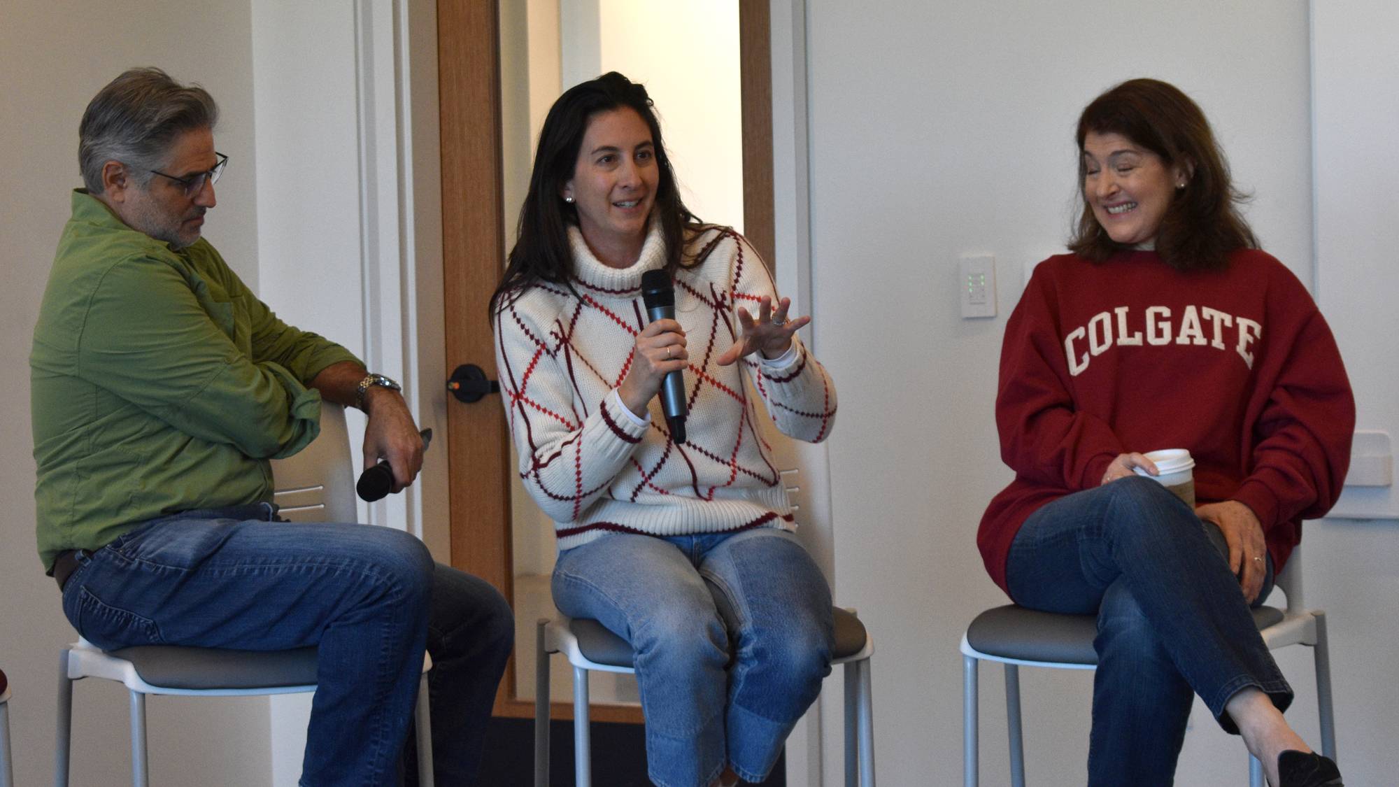 Colgate alumni Ken Carter, Allison Edgerton, and Sarah Stein seated, leading a panel discussion.