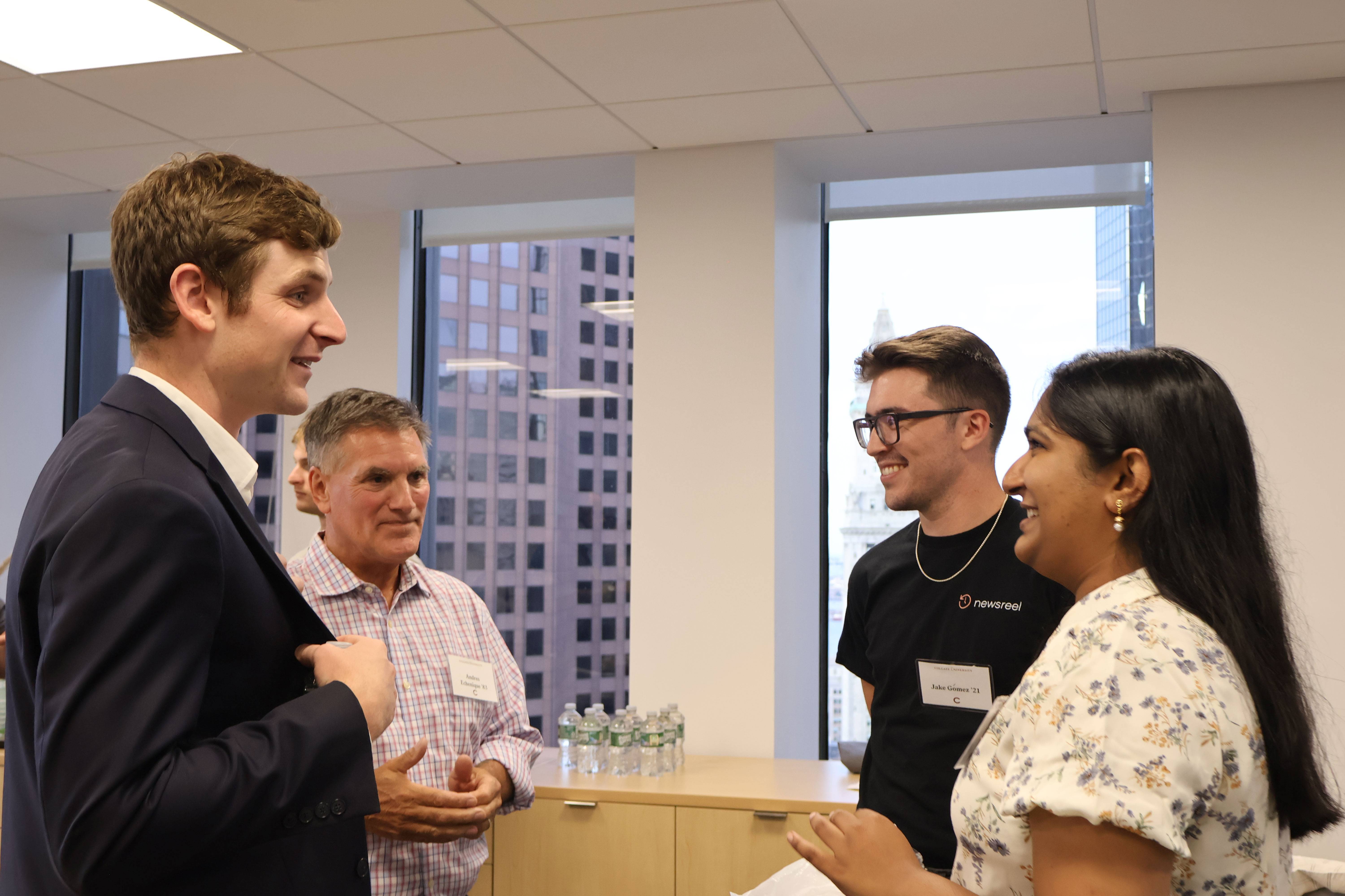 Students and alumni network at the TIA Summer Accelerator capstone reception