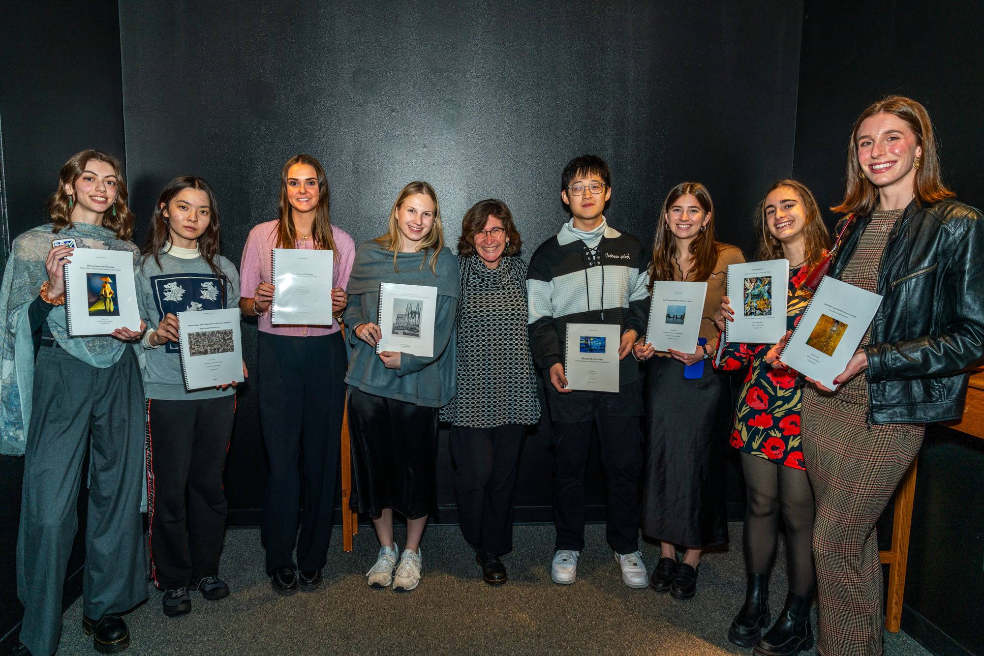 2025 Art History Seniors celebrate the completion of their capstone thesis projects with faculty advisor Prof. Elizabeth Marlowe.