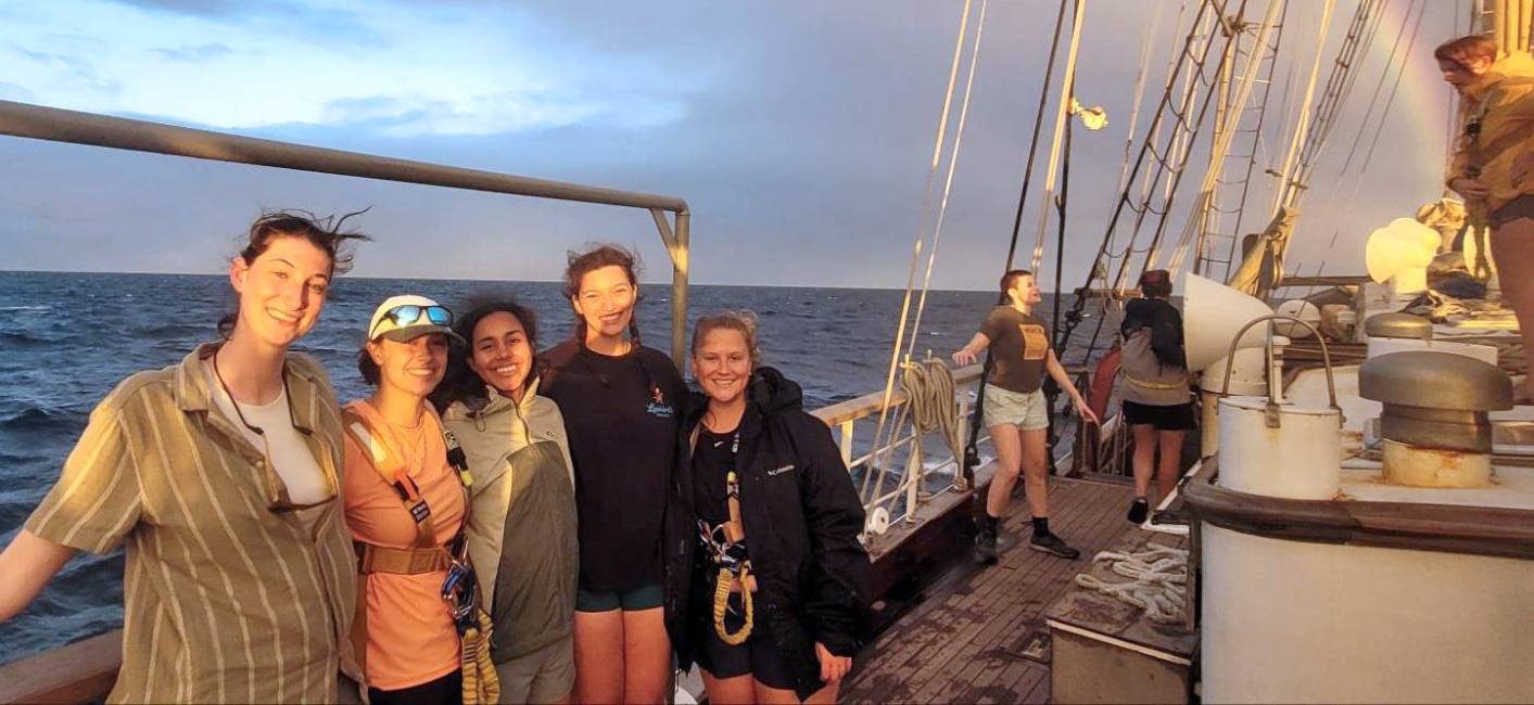 Amelia Rastley ’25 (group, right) aboard SEA's boat in Fiji