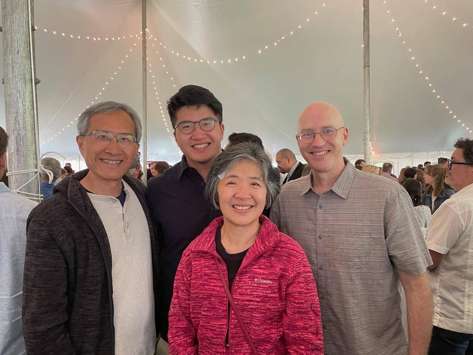 Tingkuan Hsieh '24 with parents and Professor Peter Klepeis