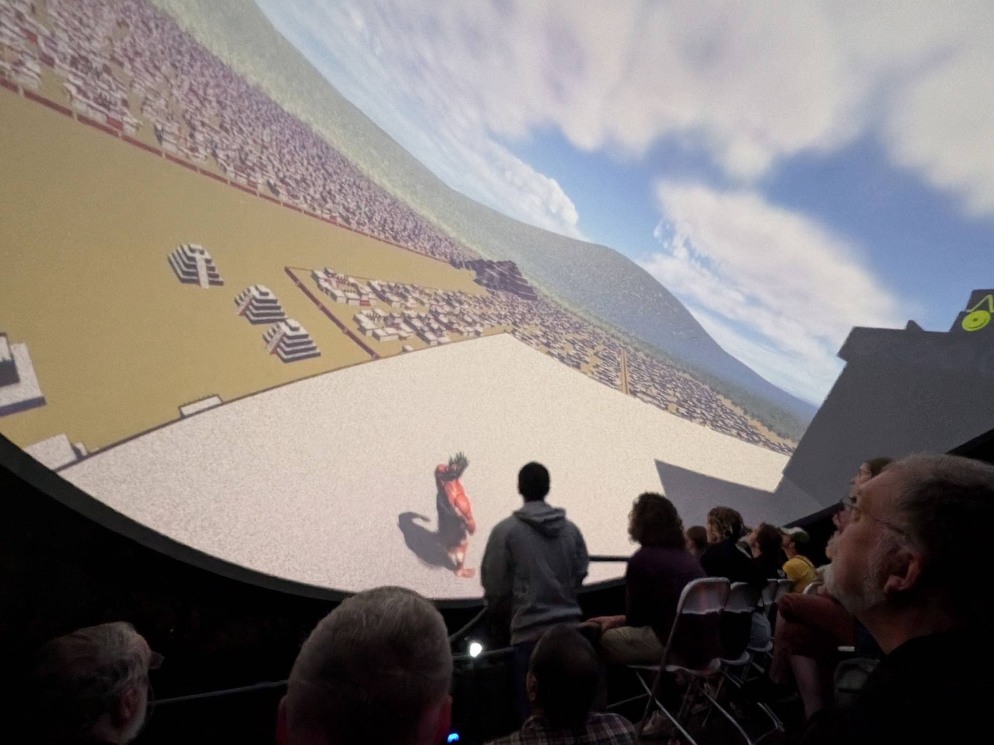 people looking at screen showing Teotihuacan model